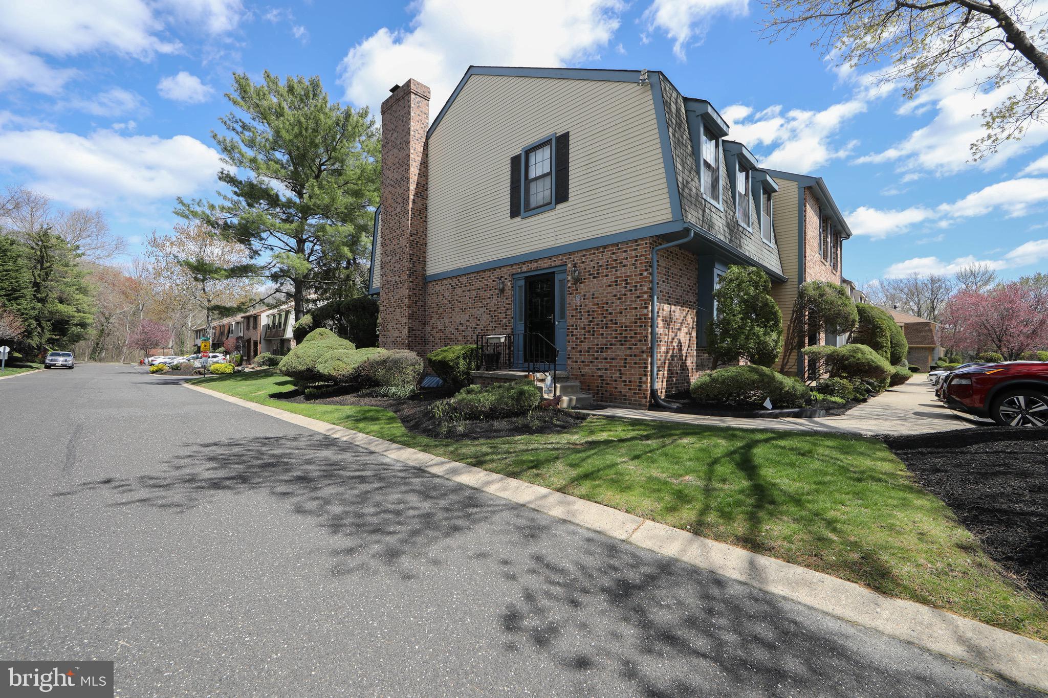 1 Crofton Commons Cherry Hill, NJ 08034 - Photo 35 of 40 a front view of a house with a yard