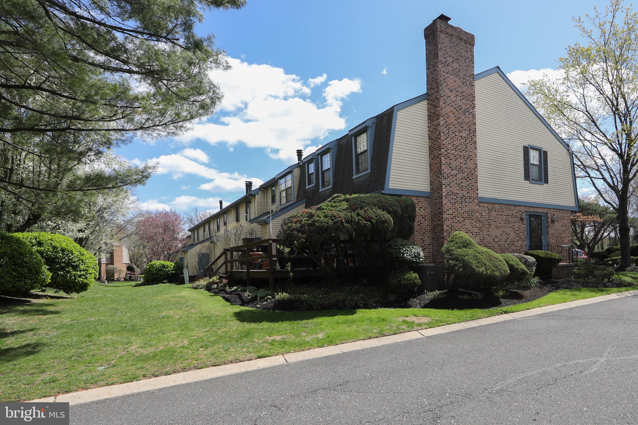 1 Crofton Commons Cherry Hill, NJ 08034 - Photo 37 of 40 a front view of a house with a garden