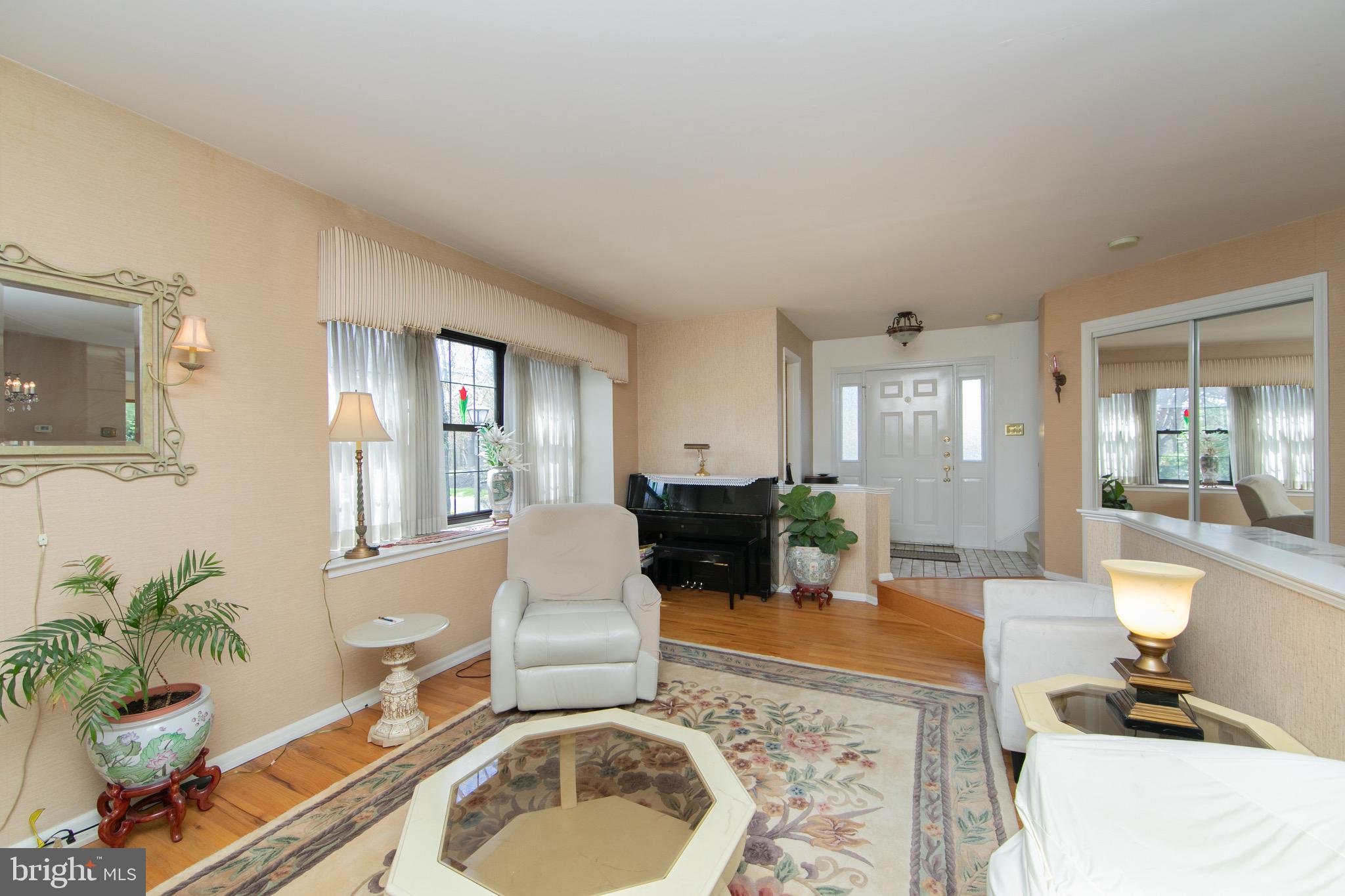 1 Crofton Commons Cherry Hill, NJ 08034 - Photo 4 of 40 a living room with furniture and a fireplace