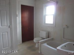 167 Independence Road East Stroudsburg, PA 18301 - Photo 2 of 11 a bathroom with a toilet and a bathtub