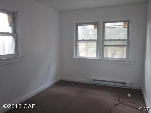 167 Independence Road East Stroudsburg, PA 18301 - Photo 5 of 11 an empty room with a window