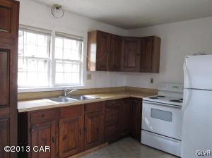 167 Independence Road East Stroudsburg, PA 18301 - Photo 9 of 11 a kitchen with a sink stove and cabinets