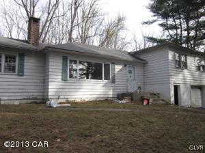 167 Independence Road East Stroudsburg, PA 18301 - Photo 10 of 11 a view of a house with a yard