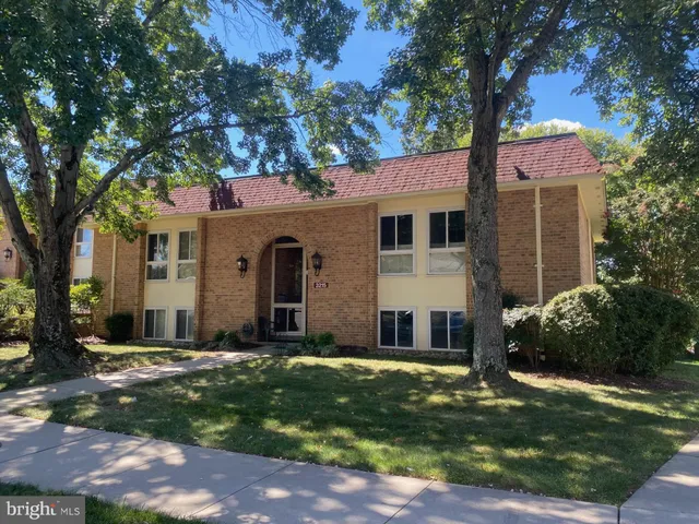 a view of house with yard