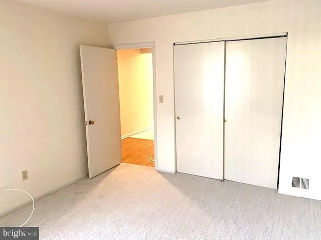 a bathroom with a sink vanity and a mirror