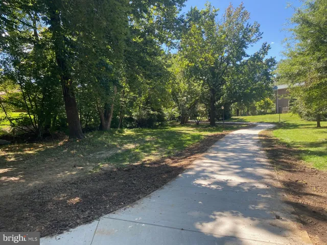 a room with lots of chairs and mirrors