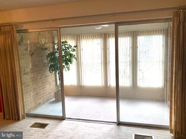 a view of a glass entrance door
