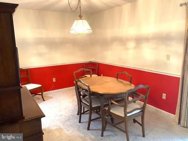 a kitchen with cabinets and stainless steel appliances