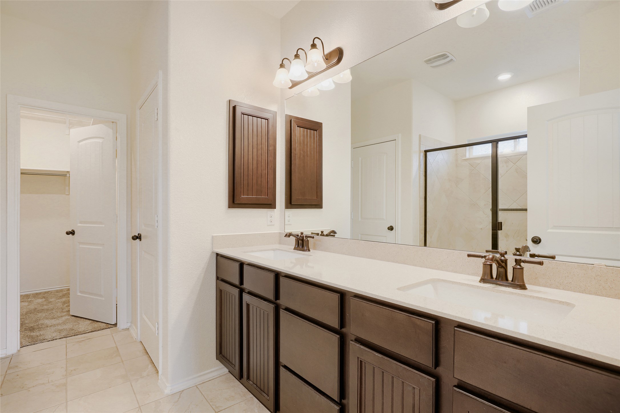 104 Kavanaugh Street Georgetown, TX 78628 - Photo 12 of 30 Dual vanity and natural light