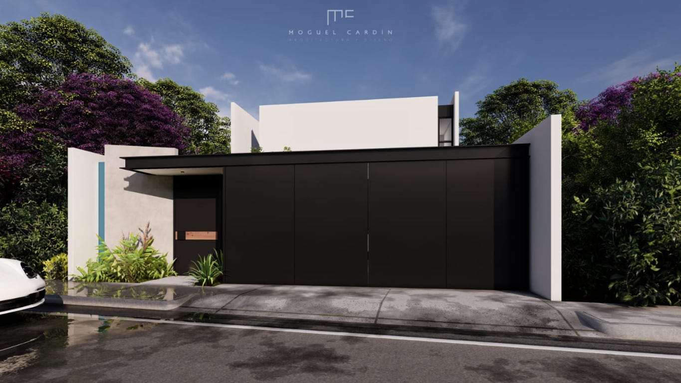 a backyard of a house with lots of green space and plants