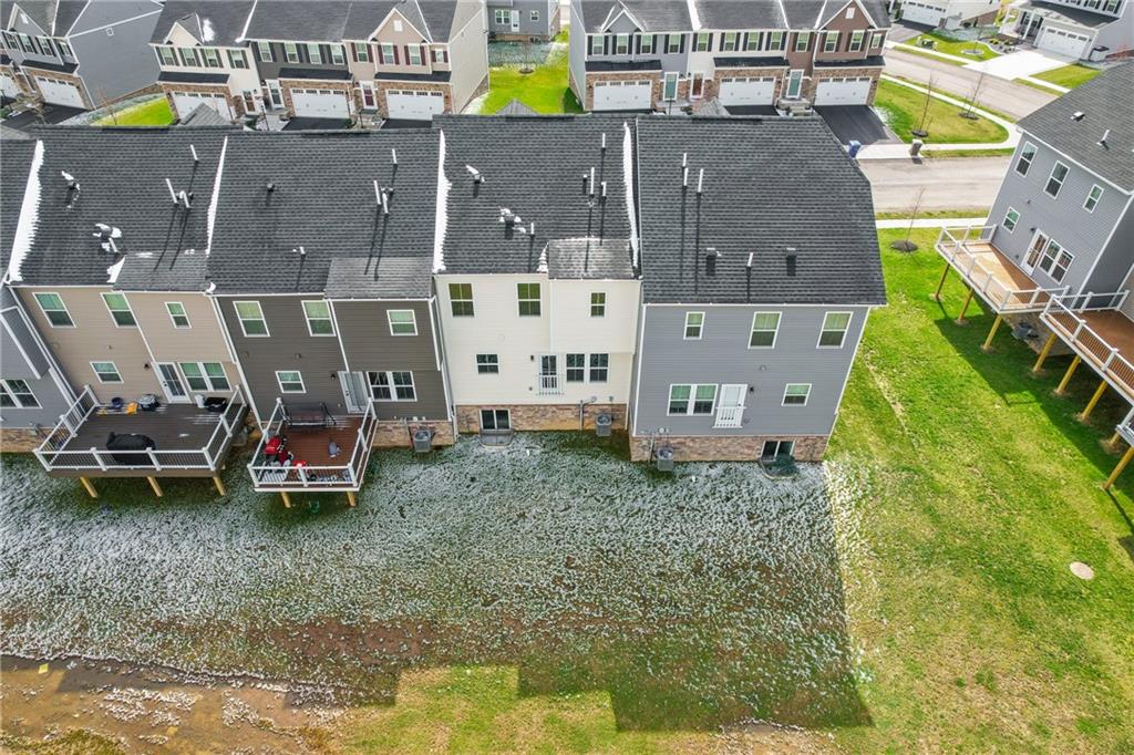 327 Helenium Drive Mars, PA 16046 - Photo 2 of 35 a aerial view of a house with a garden and parking space