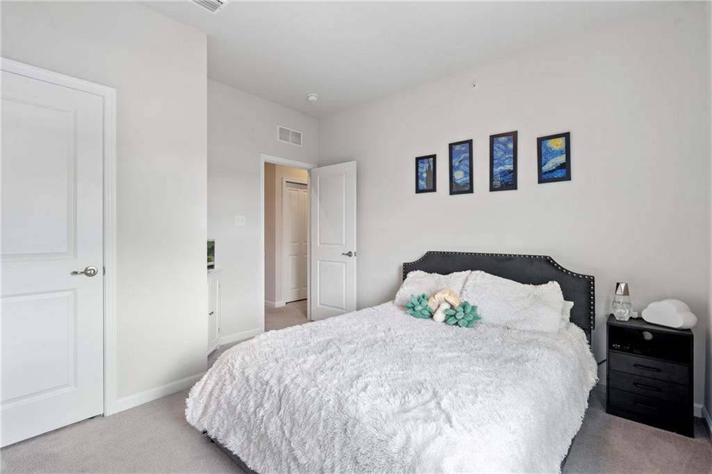 327 Helenium Drive Mars, PA 16046 - Photo 22 of 35 a bedroom with a bed and a night stand