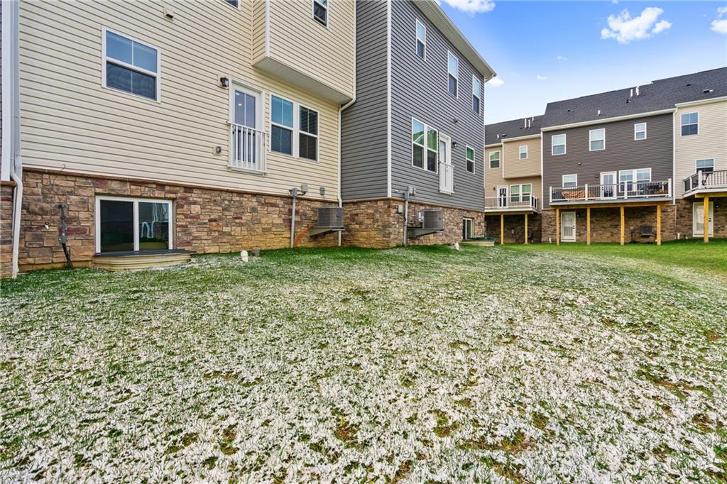 327 Helenium Drive Mars, PA 16046 - Photo 34 of 35 a view of a house with a yard