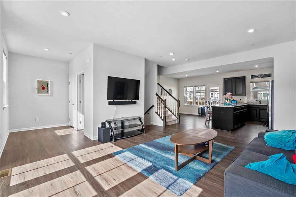327 Helenium Drive Mars, PA 16046 - Photo 5 of 35 a living room with furniture and a flat screen tv