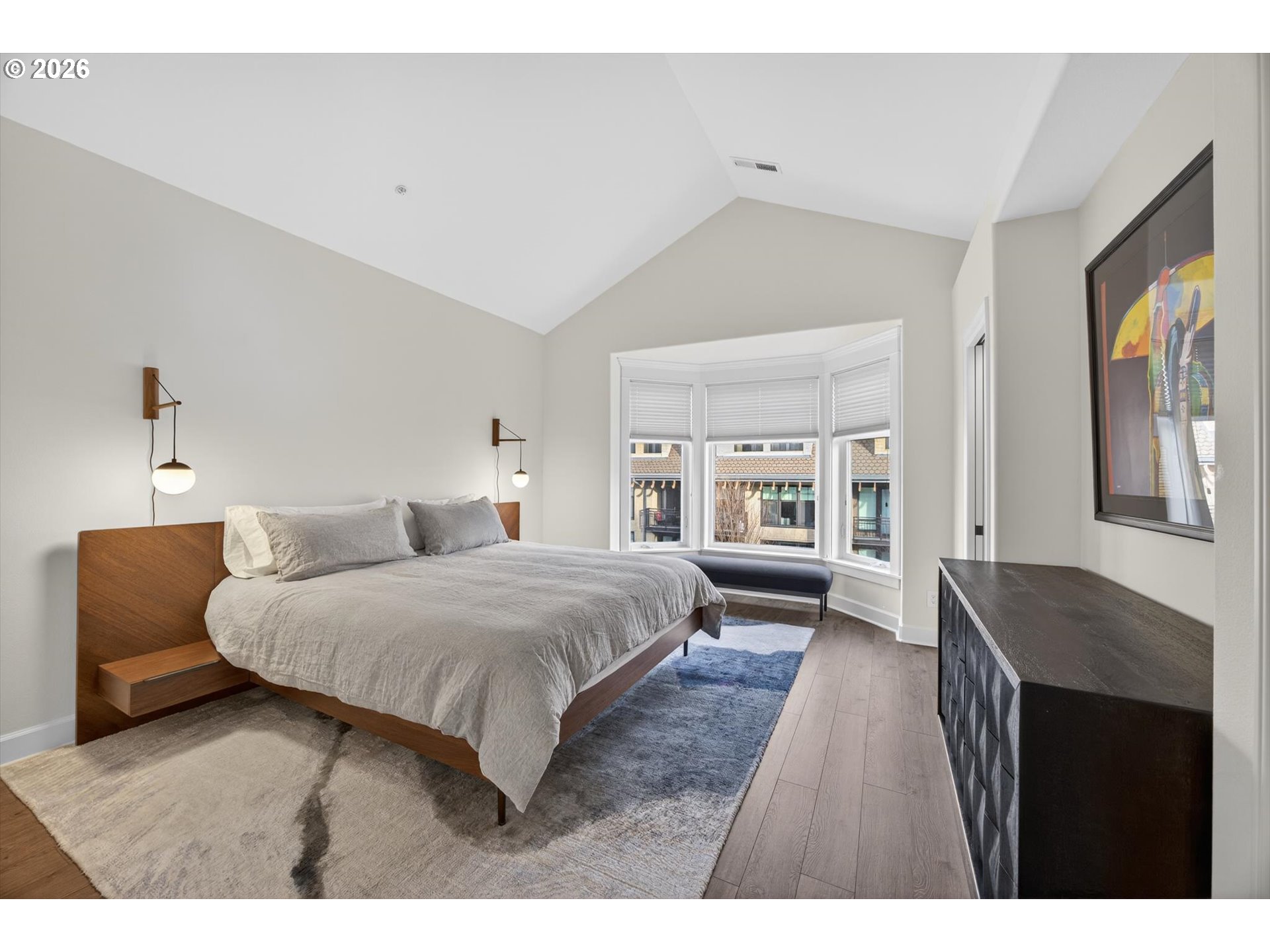 314 2nd Street Lake Oswego, OR 97034 - Photo 15 of 41 a spacious bedroom with a bed a couch and large window