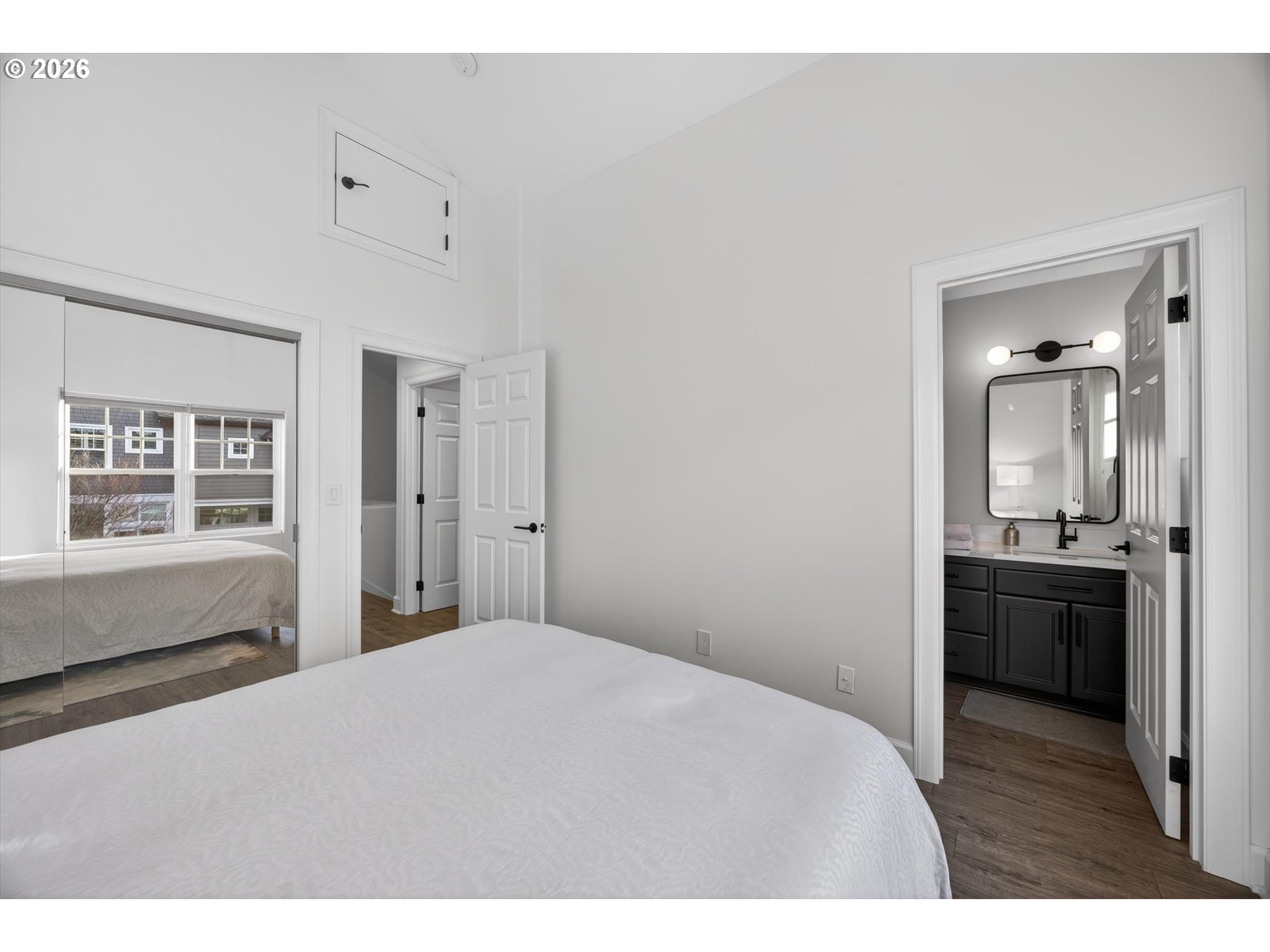 314 2nd Street Lake Oswego, OR 97034 - Photo 23 of 41 a bedroom with a bed and wooden floor