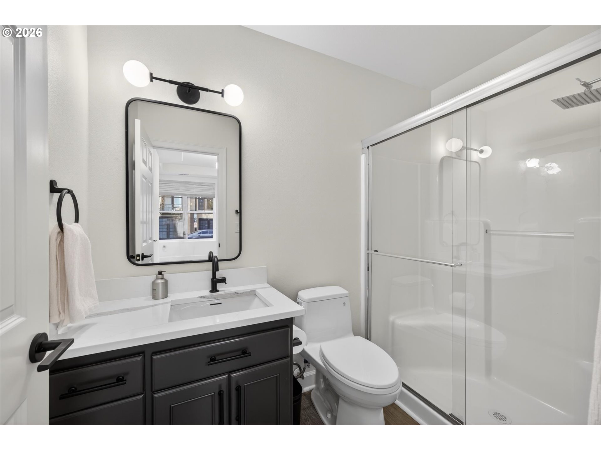314 2nd Street Lake Oswego, OR 97034 - Photo 27 of 41 a bathroom with a toilet sink shower and mirror