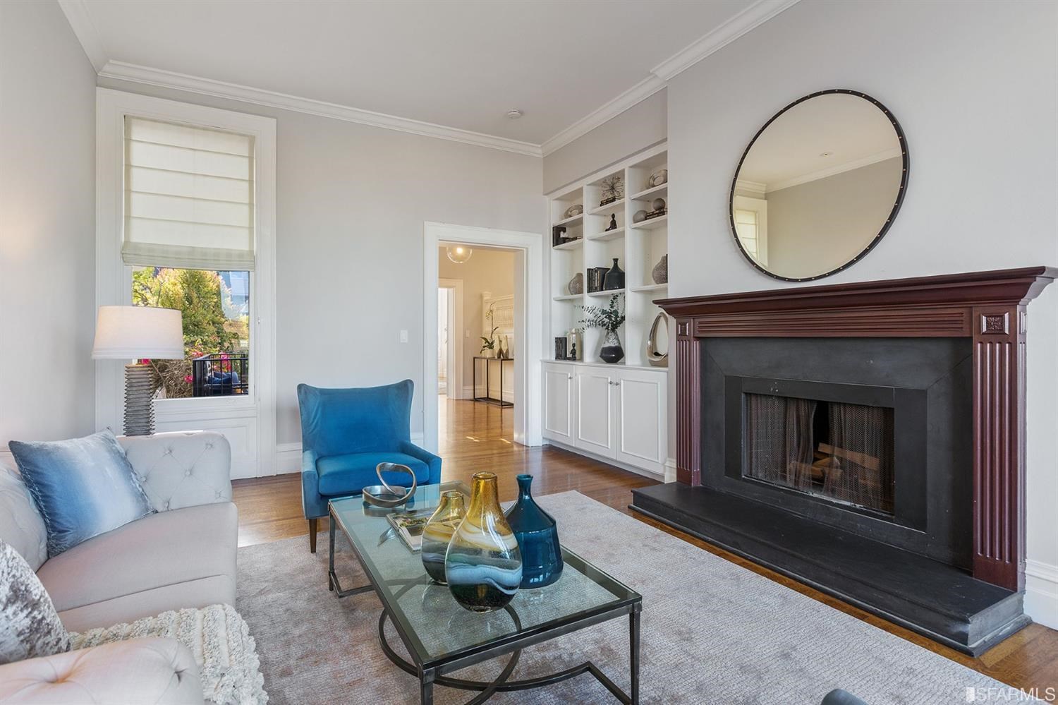 2526 Union Street San Francisco, CA 94123 - Photo 14 of 78 a living room with furniture a mirror and a fireplace