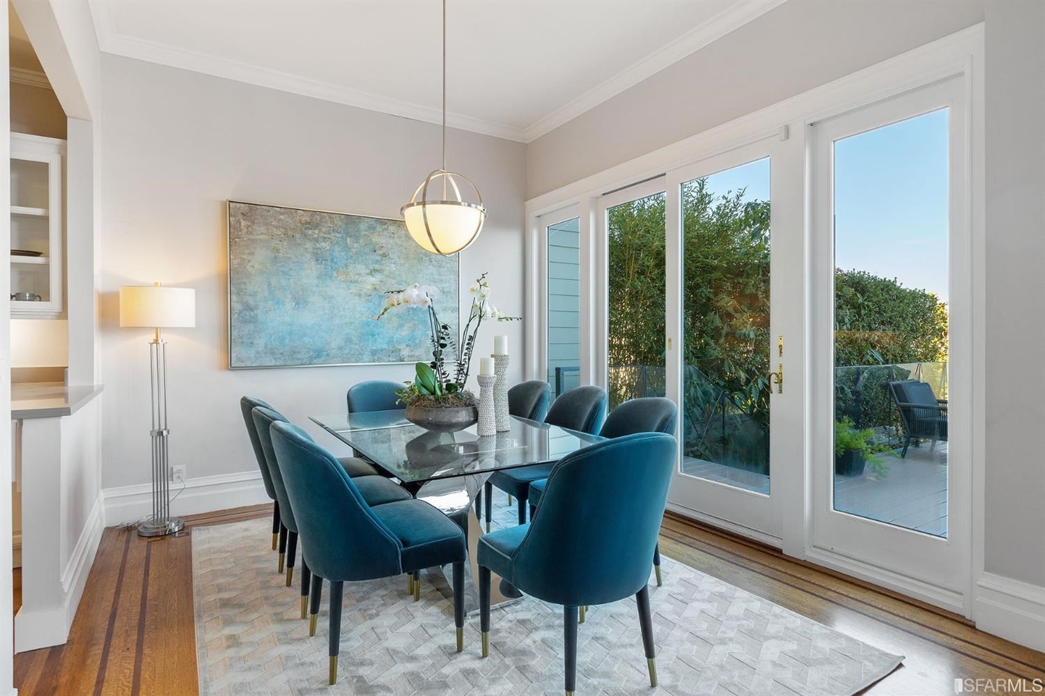 2526 Union Street San Francisco, CA 94123 - Photo 18 of 78 a view of a dining room with furniture wooden floor and a chandelier