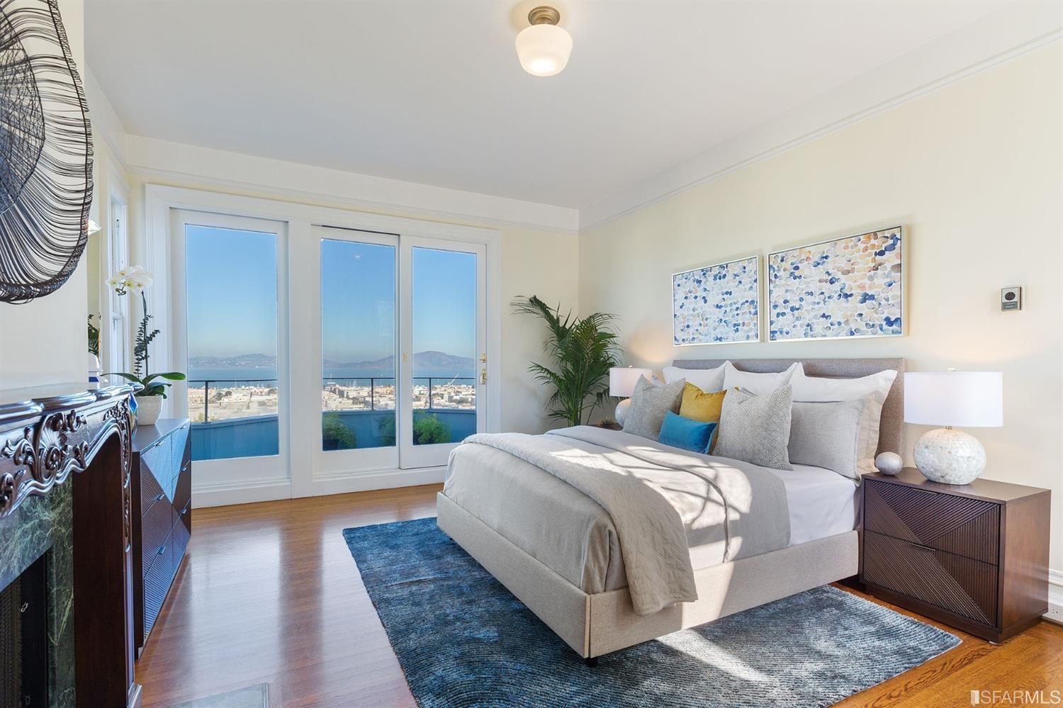 2526 Union Street San Francisco, CA 94123 - Photo 2 of 78 a spacious bedroom with a bed a couch and dresser