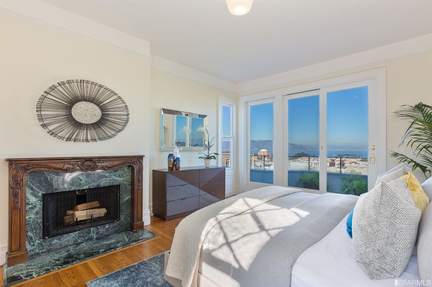2526 Union Street San Francisco, CA 94123 - Photo 33 of 78 a bedroom with a bed and a fireplace