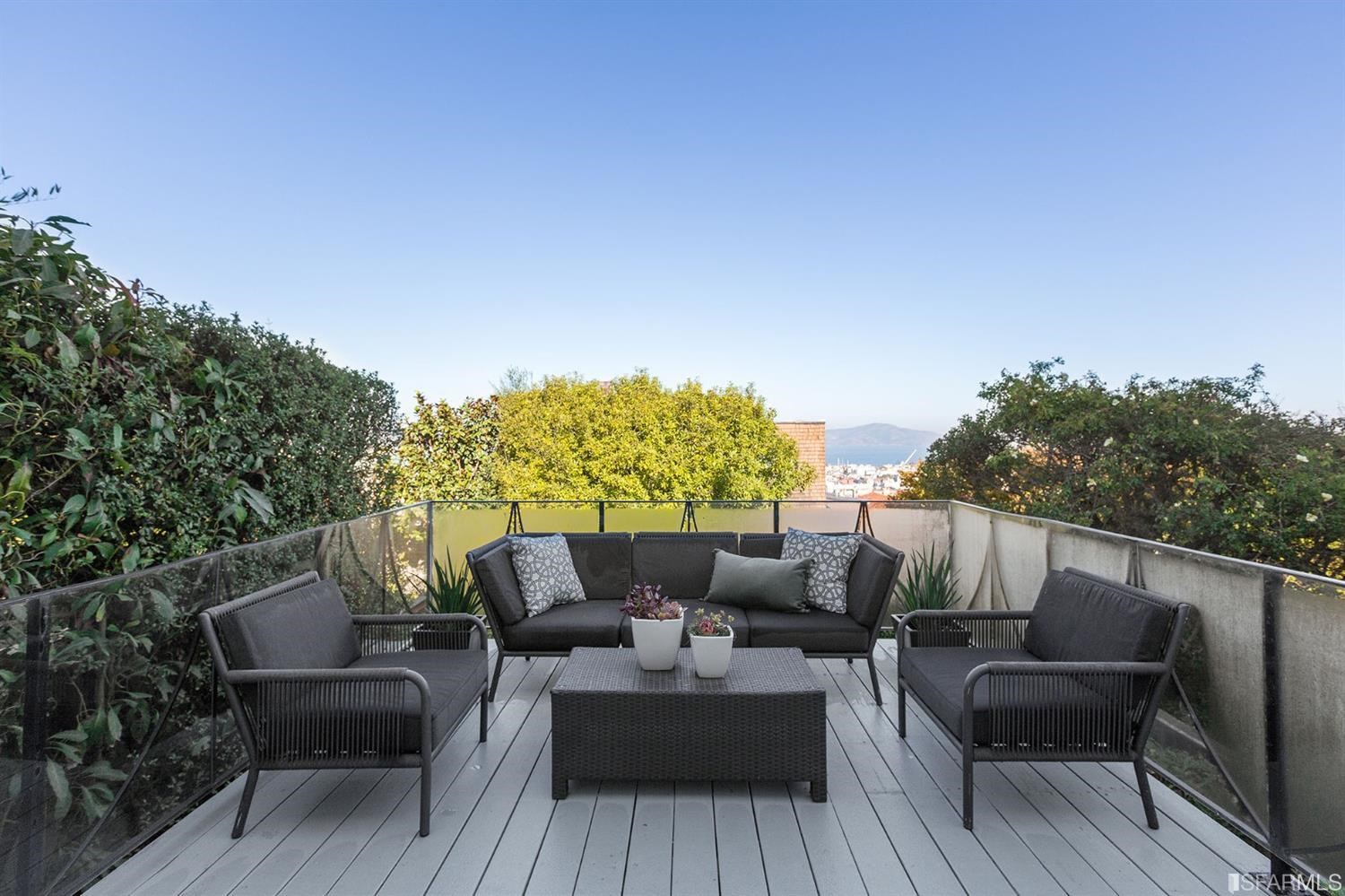 2526 Union Street San Francisco, CA 94123 - Photo 4 of 78 a roof deck with couches and wooden floor