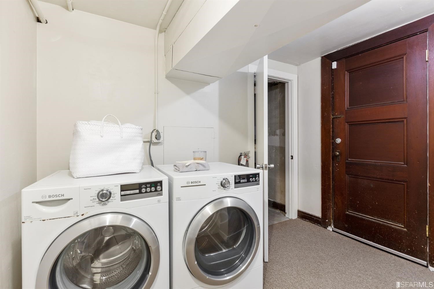 2526 Union Street San Francisco, CA 94123 - Photo 59 of 78 a view of storage and utility room with washer and dryer