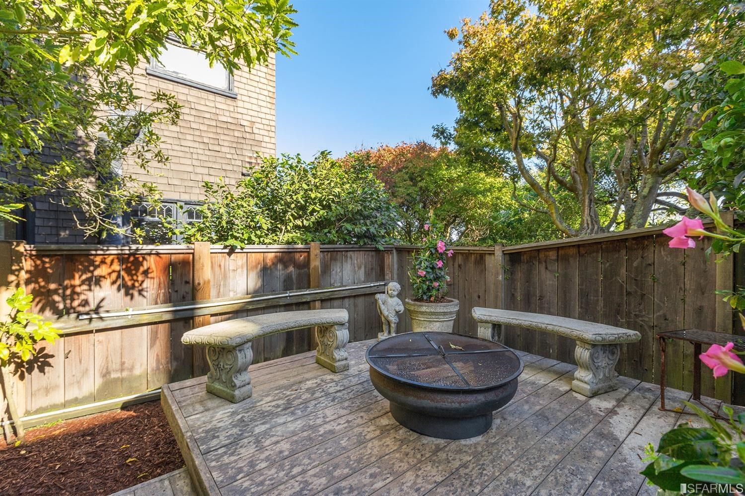 2526 Union Street San Francisco, CA 94123 - Photo 68 of 78 a backyard of a house with table and chairs
