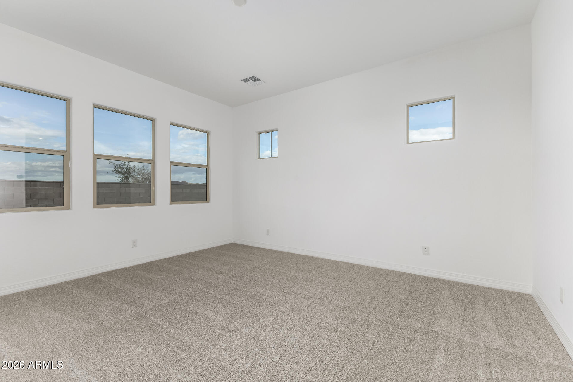 17408 West Via Dona Road Surprise, AZ 85387 - Photo 8 of 17 an empty room with windows