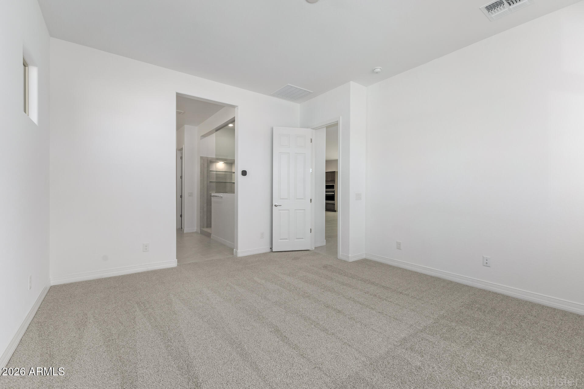 17408 West Via Dona Road Surprise, AZ 85387 - Photo 9 of 17 a view of an empty room and closet