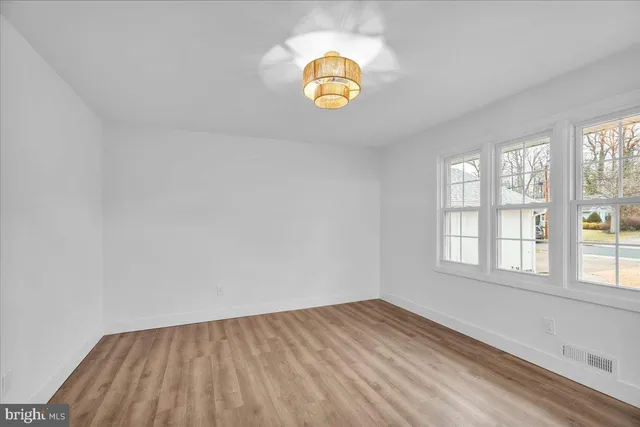 a bathroom with a shower sink and mirror