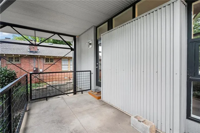 a view of staircase with window