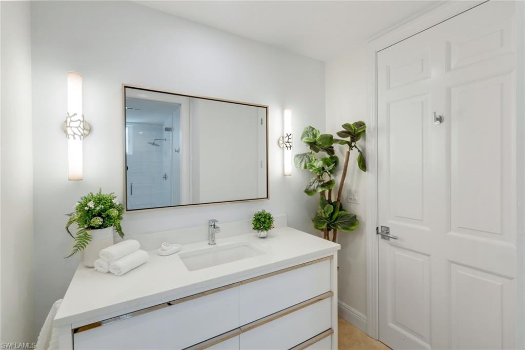 275 Indies Way, Unit 1503 Naples, FL 34110 - Photo 23 of 49 Guest Bath & Powder Room