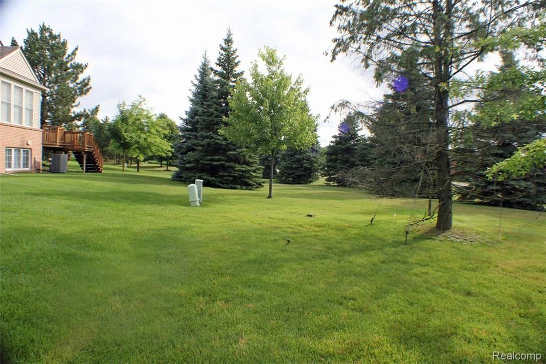 1358 Copper Circle, Unit 20 Rochester, MI 48306 - Photo 23 of 23 Backyard.jpg