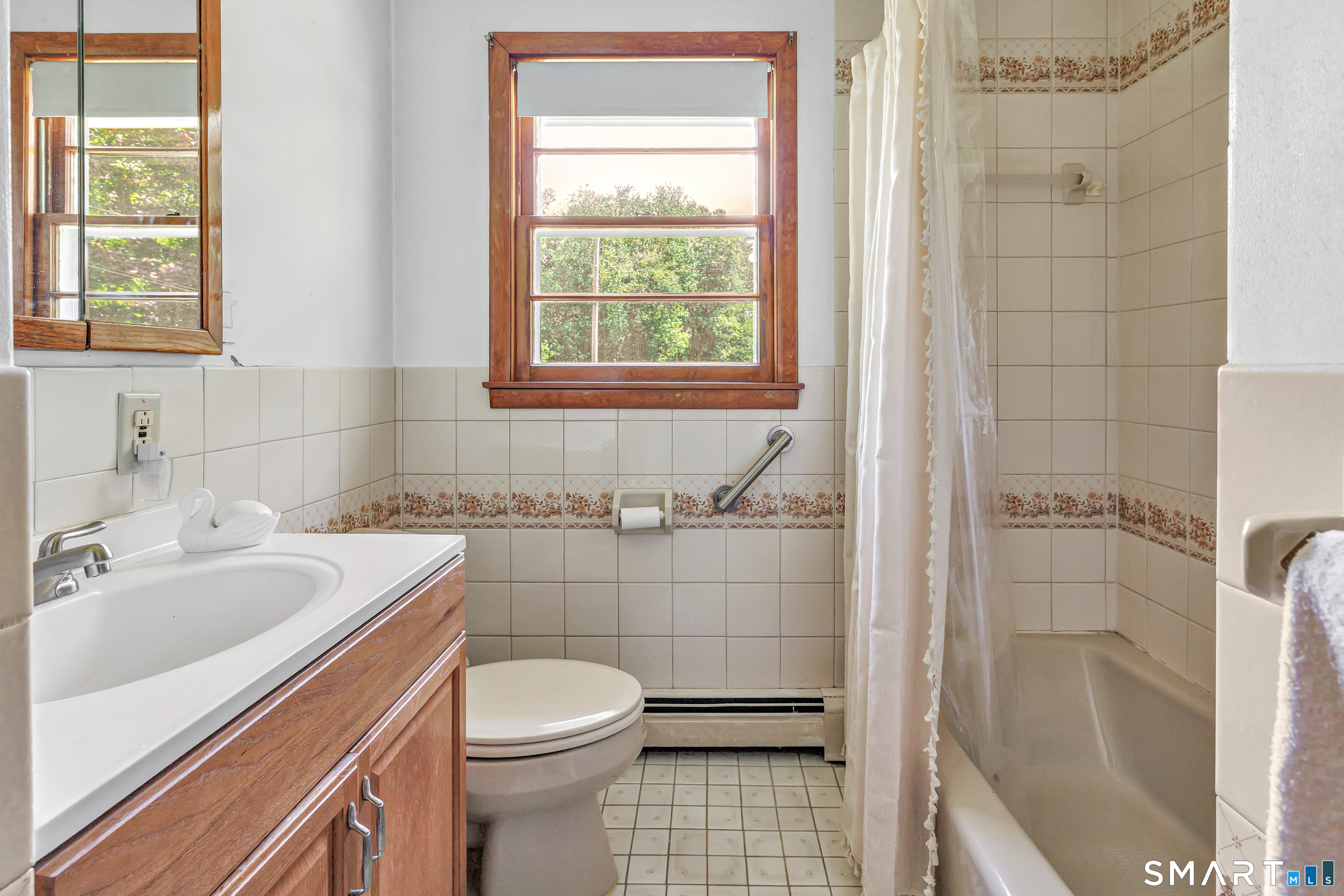 223 Wheeler Road Monroe, CT 06468 - Photo 22 of 35 a bathroom with a sink a toilet and shower