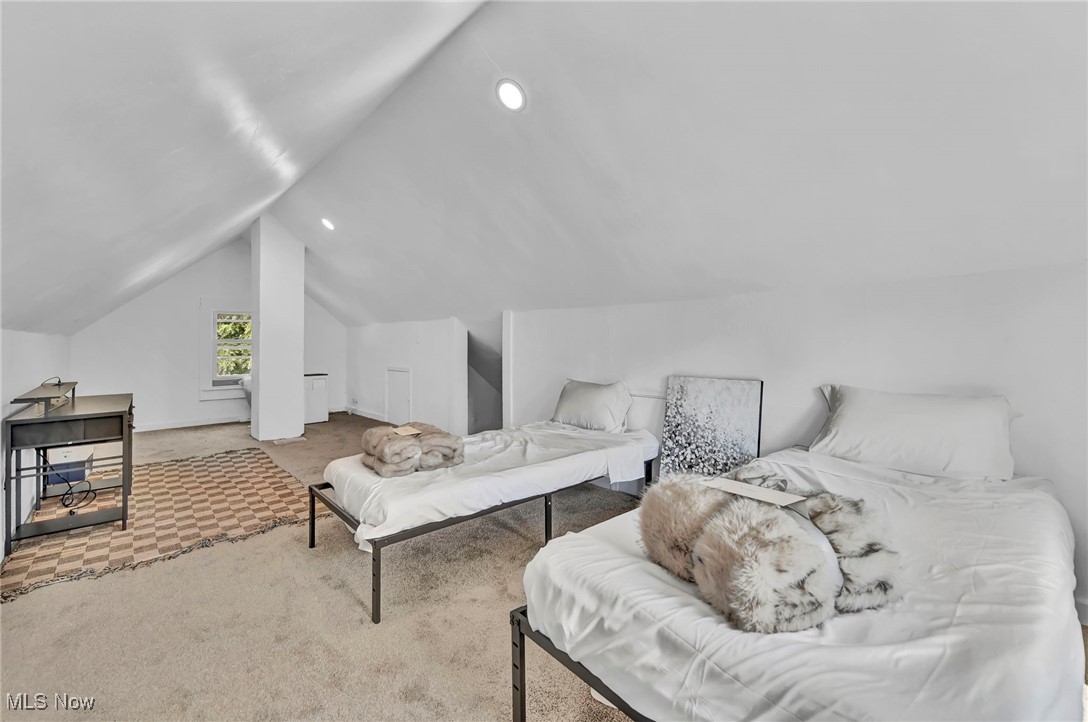 732 Carpenter Street Akron, OH 44310 - Photo 31 of 38 Bedroom on third floor with vaulted ceiling and recessed lighting
