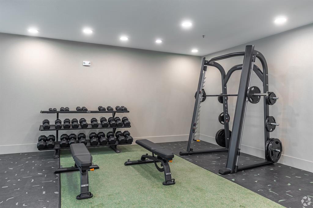 596 West 9th Street, Unit 325 Dallas, TX 75208 - Photo 6 of 25 a view of a room with gym equipment