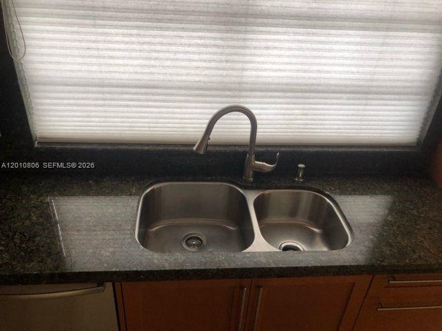 9910 Southwest 23rd Street Miami, FL 33165 - Photo 12 of 39 a close view of sink and tap