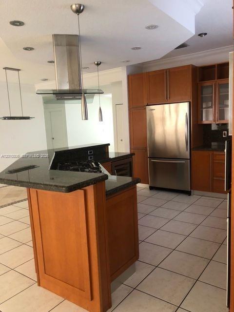 9910 Southwest 23rd Street Miami, FL 33165 - Photo 13 of 39 a kitchen with stainless steel appliances granite countertop a refrigerator and a sink