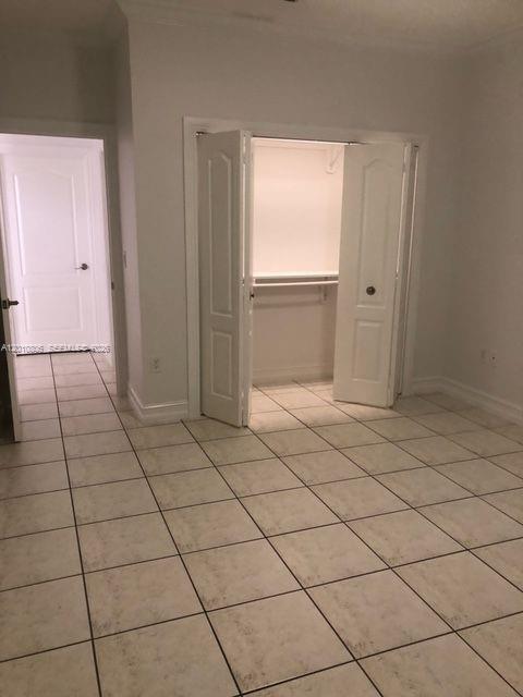 9910 Southwest 23rd Street Miami, FL 33165 - Photo 18 of 39 a view of a livingroom and entryway