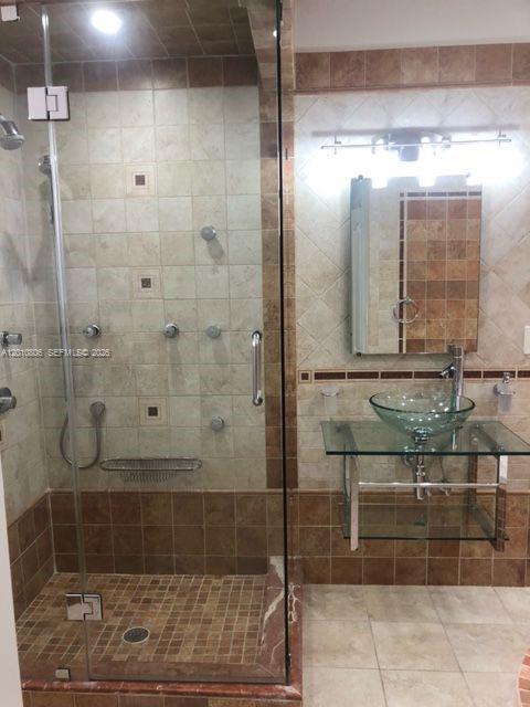 9910 Southwest 23rd Street Miami, FL 33165 - Photo 27 of 39 a bathroom with a shower