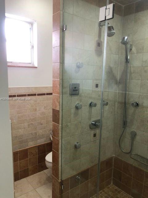 9910 Southwest 23rd Street Miami, FL 33165 - Photo 28 of 39 a bathroom with a shower