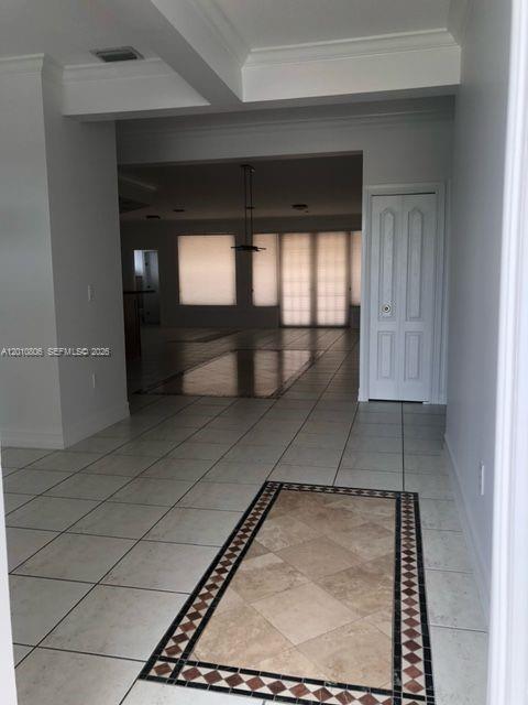 9910 Southwest 23rd Street Miami, FL 33165 - Photo 4 of 39 a view of entryway