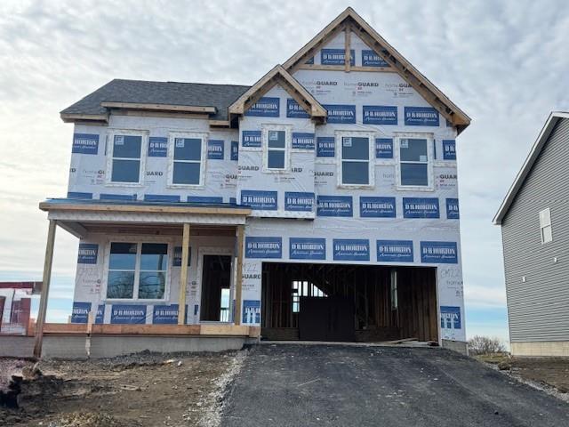 a front view of a building with a blue and white door