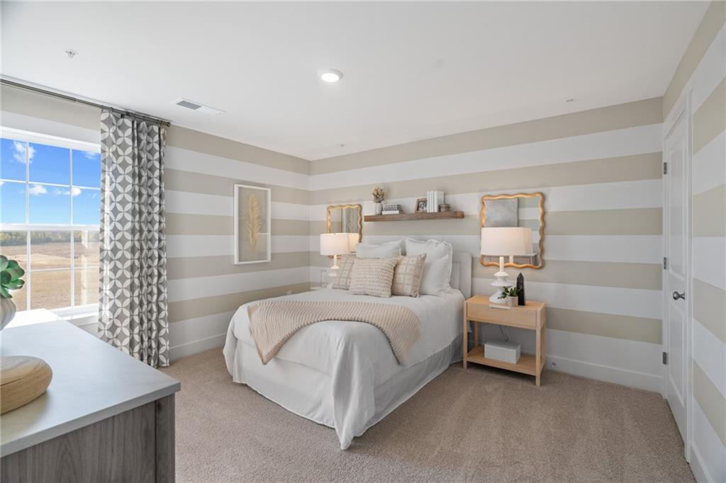 1020 Lindsay Road Carnegie, PA 15106 - Photo 16 of 32 a spacious bedroom with a bed and a couch