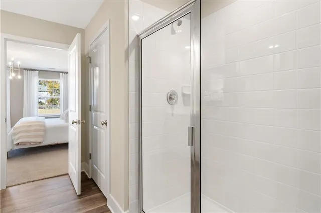 a view of a bathroom from a hallway