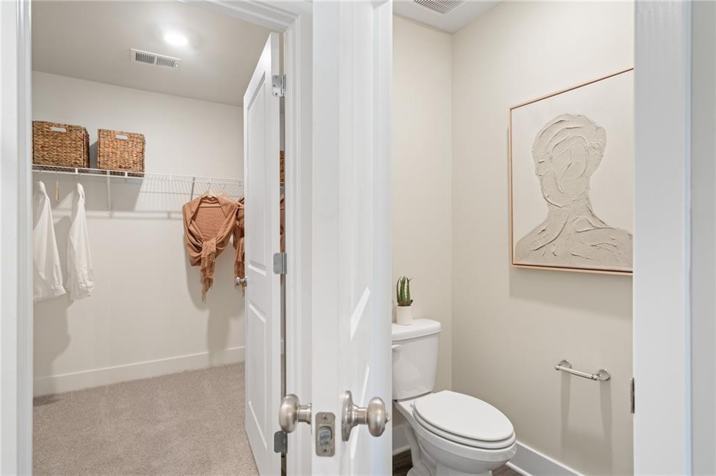 1020 Lindsay Road Carnegie, PA 15106 - Photo 28 of 32 a white toilet sitting next to a bathroom sink