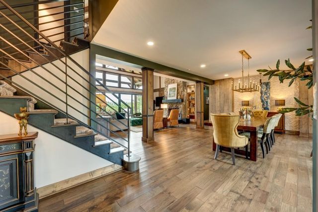 a view of a dining room with furniture window and outside view