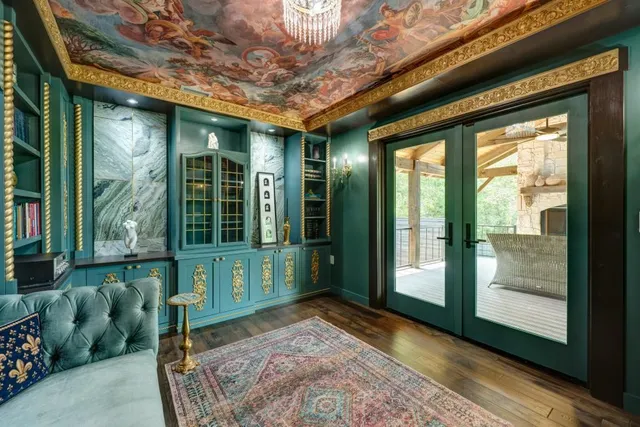 a view of a backyard with wooden fence