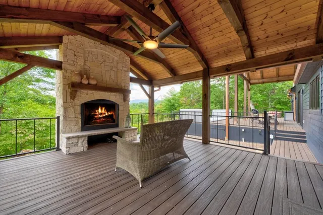 a view of a patio with wooden floor